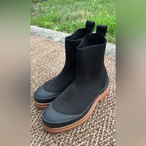 Black Everlane boots, slip ons